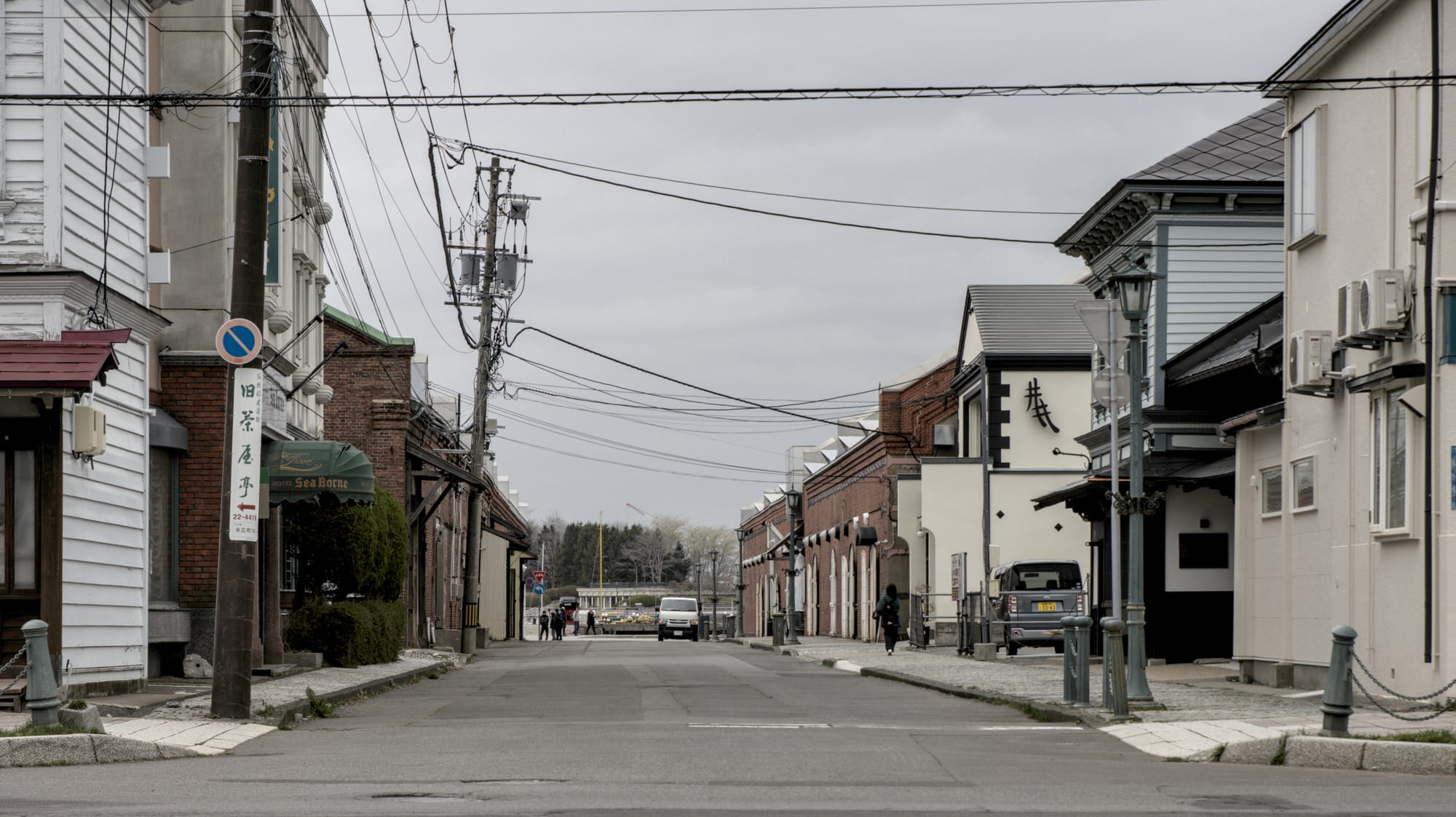 Down the block to the Port with Red Brick Warehouses on both sides