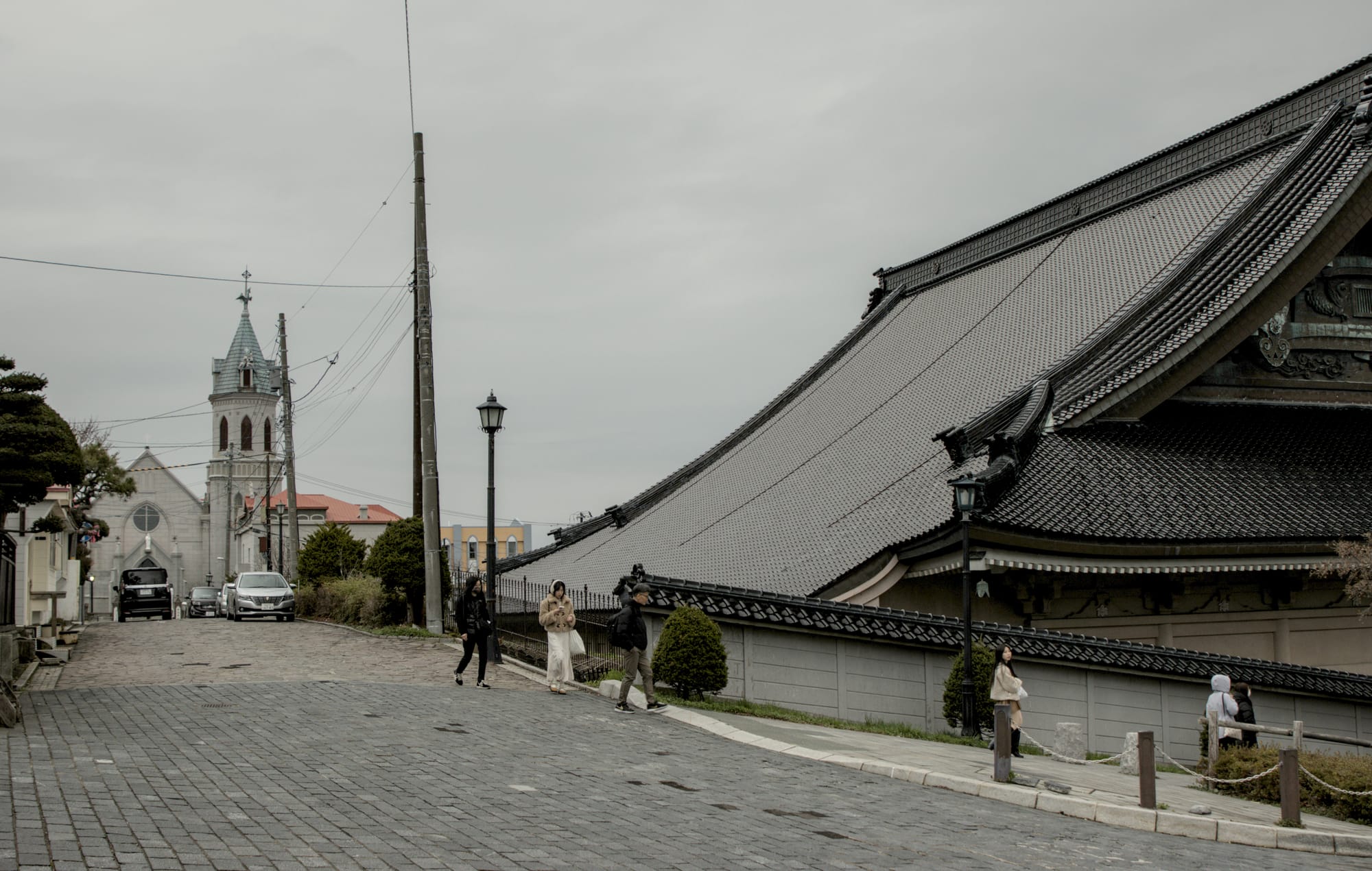 Hokaido Catholic Church behind Buddhist temple